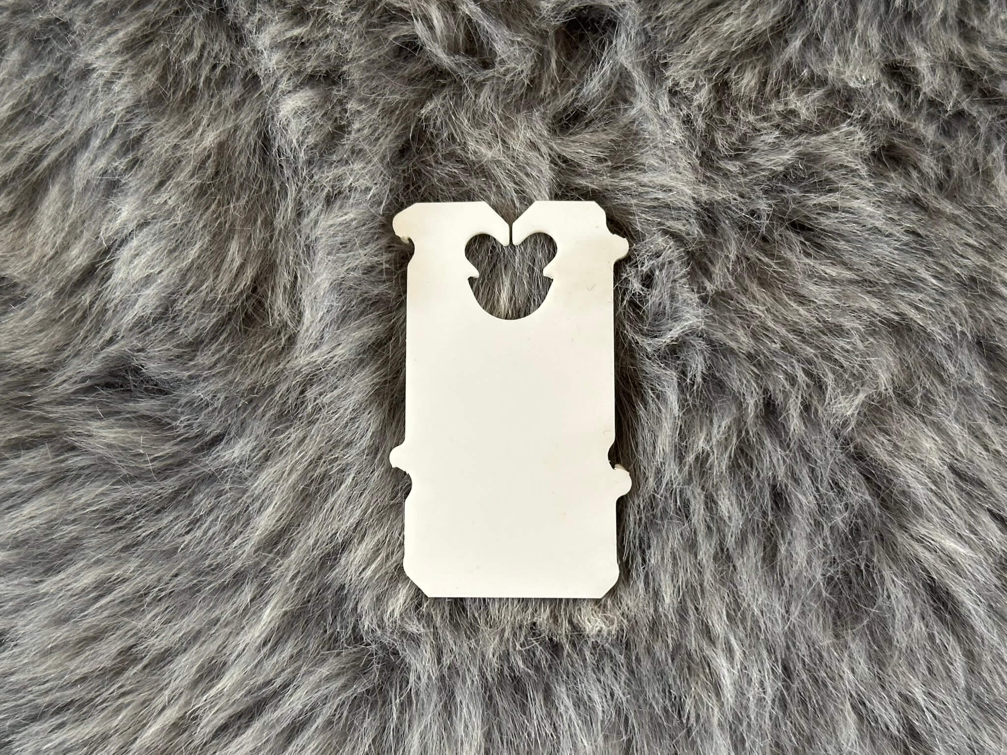 Tall white bread tag on a fluffy background